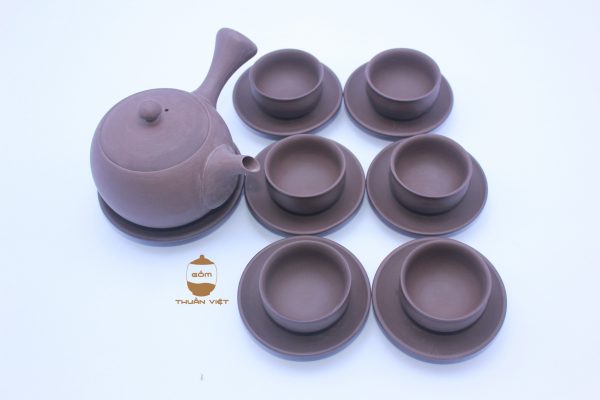 Brown tea set horizontal hand